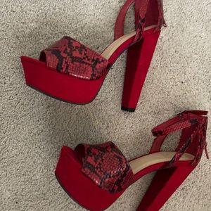 Y2K red snakeskin platform heels